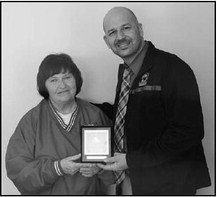 District Presents Service Award To Jeanne Feucht